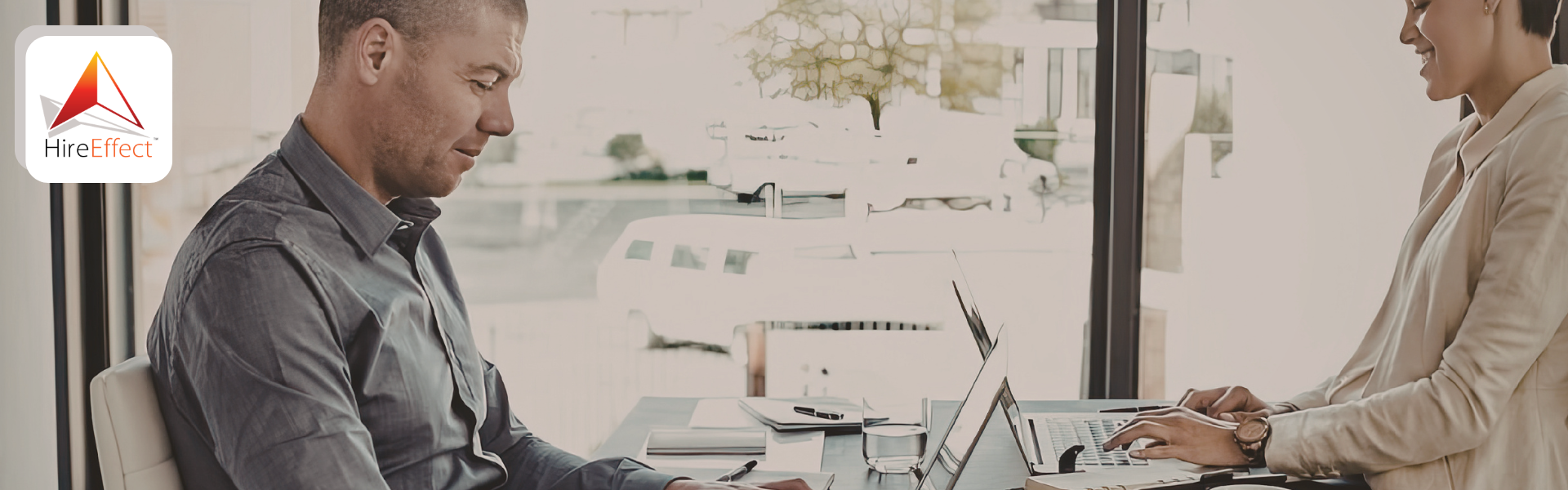 small business owner reviewing monthly financial reports with an advisor